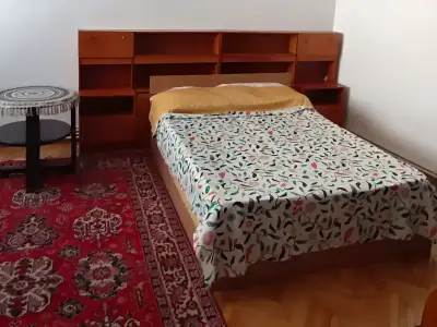 Apartament de inchiriere Sector 5 Bucuresti dormitor cu covor